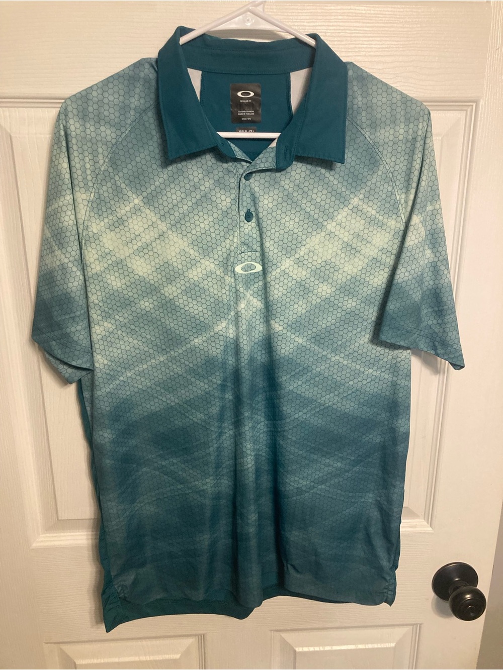 Oakley Teal Gradient Geometric Polo